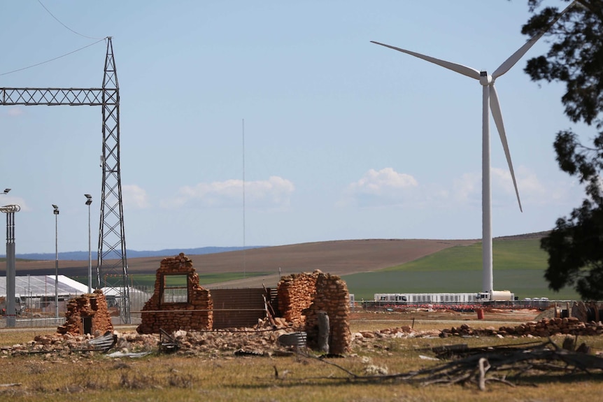 Building ruins with a windfarm turbine next to it