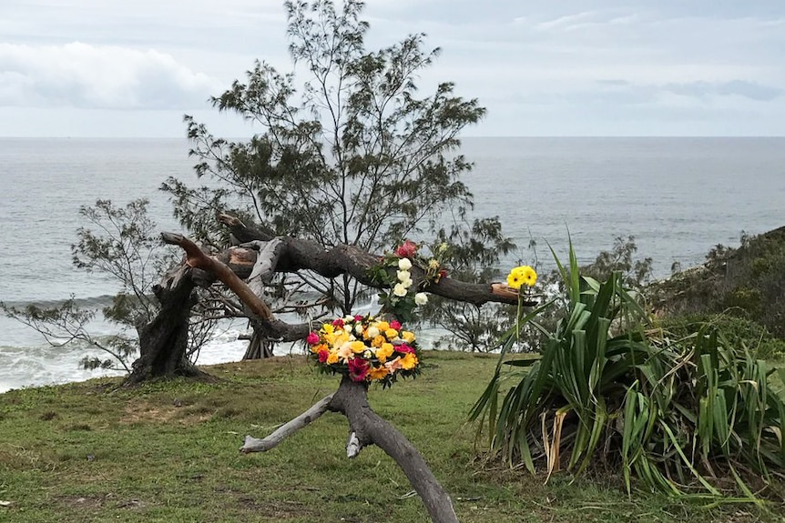 Wreaths laid at a makeshift memorial in Seventeen Seventy near where trawler Dianne capsized.