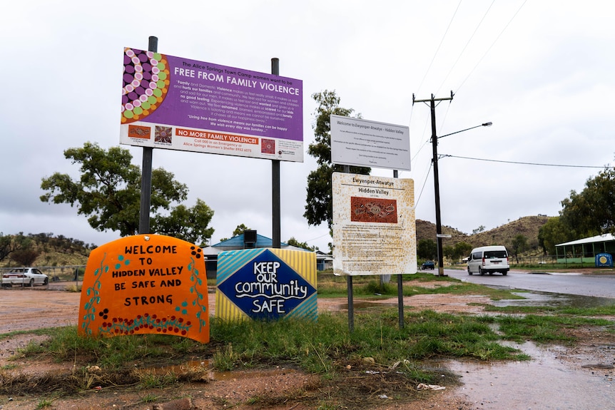 Signs speaking about community safety and freedom from domestic violence in Hidden Valley