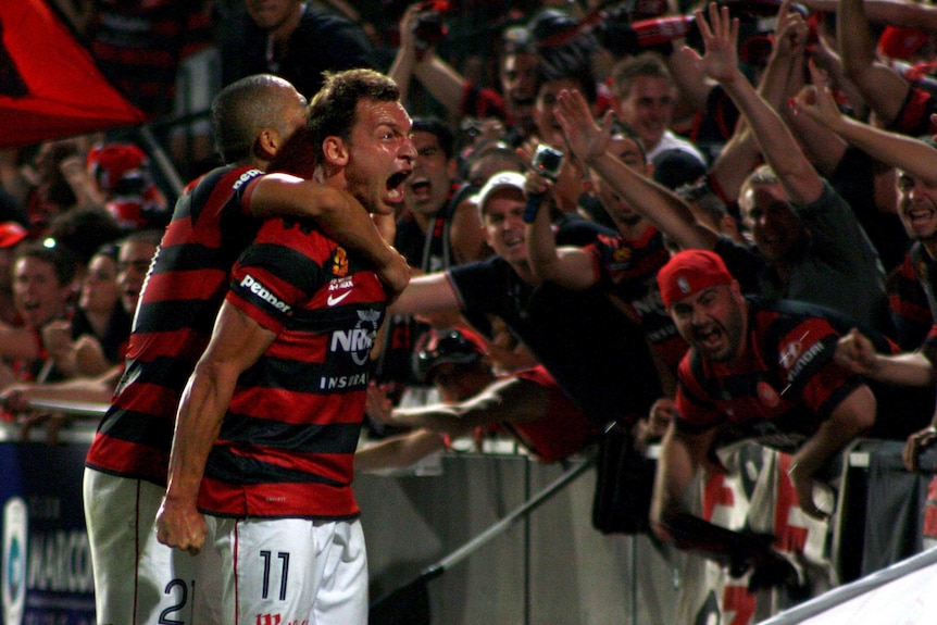 Brendon Santalab celebrates scoring the winner in the 87th minute against Sydney FC.