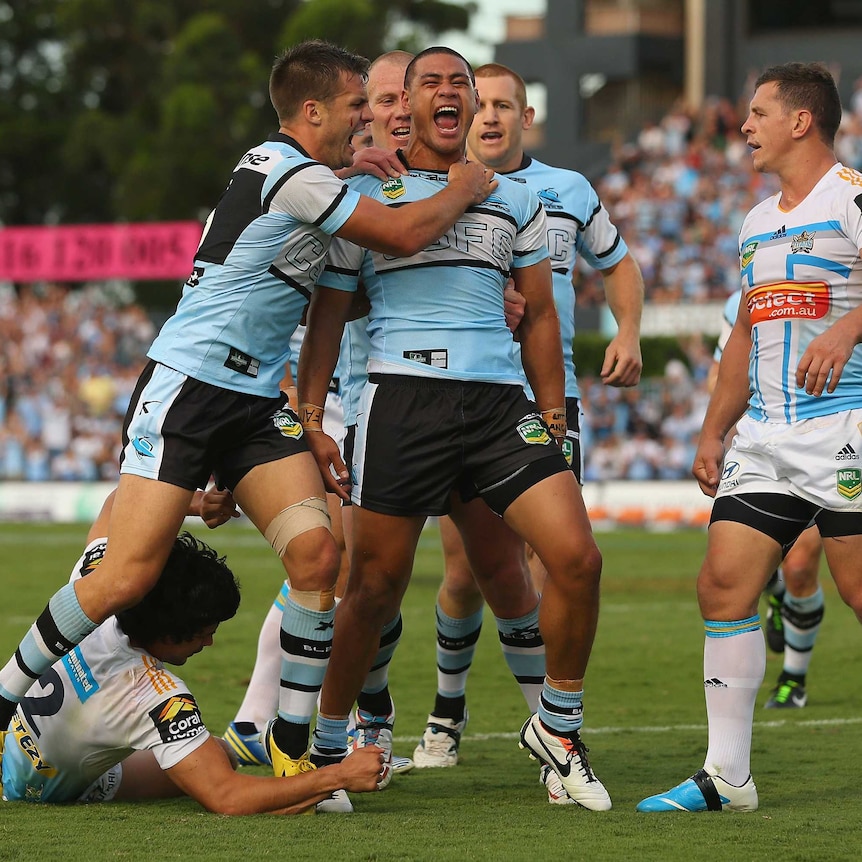 Sharks celebrate Matthew Wright's try