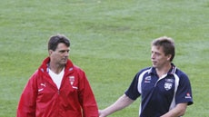 Swans coach Paul Roos and his Geelong counterpart Mark Thompson
