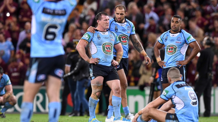 Paul Gallen is consoled after losing State Of Origin II