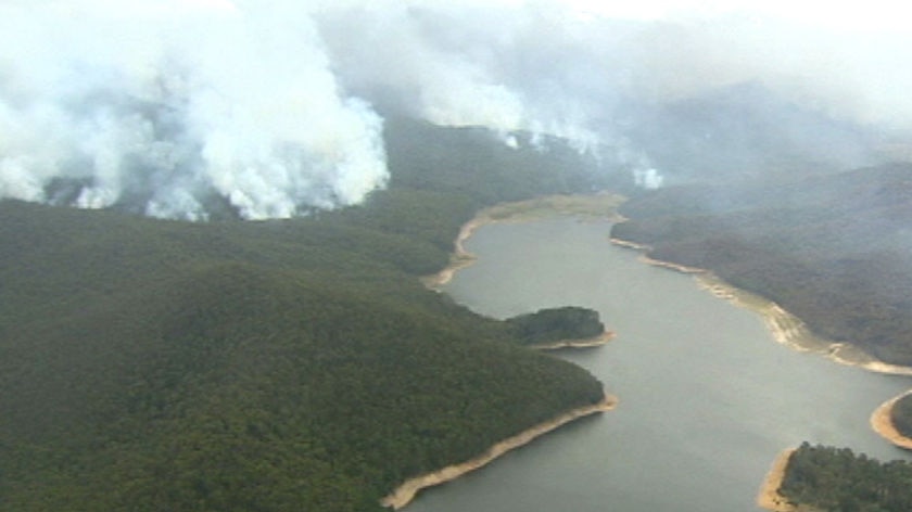 Bushfires burn around water catchments.