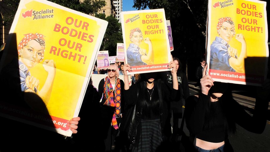 Activists marching in Brisbane at the 'Rally to End Rape Culture' march in Brisbane.