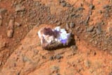 White rock appears on Mars