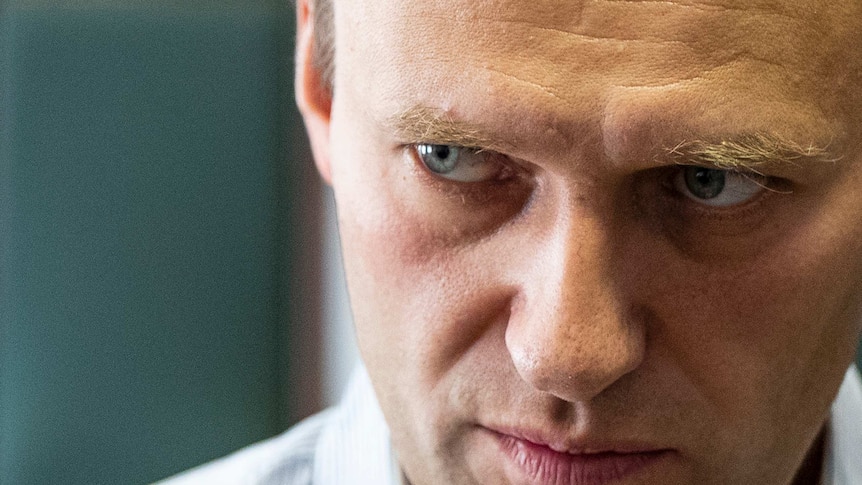 An up-close shot of Russian opposition leader Alexei Navalny looking serious.