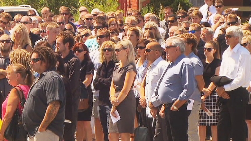 A large crowd attends the funeral for the Little family in Port Lincoln.