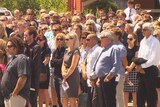 A large crowd attends the funeral for the Little family in Port Lincoln.
