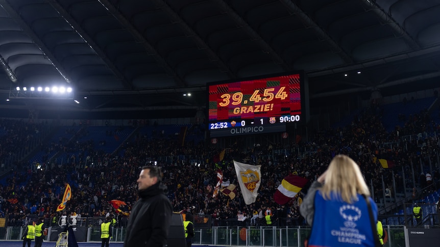 A stadium sign shows an attendance number during a women's game in Italy