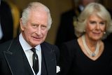 Close up of King Charles with Camilla walking out of Westminster Hall. 