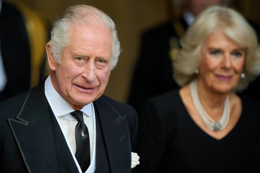 Close up of King Charles with Camilla walking out of Westminster Hall. 