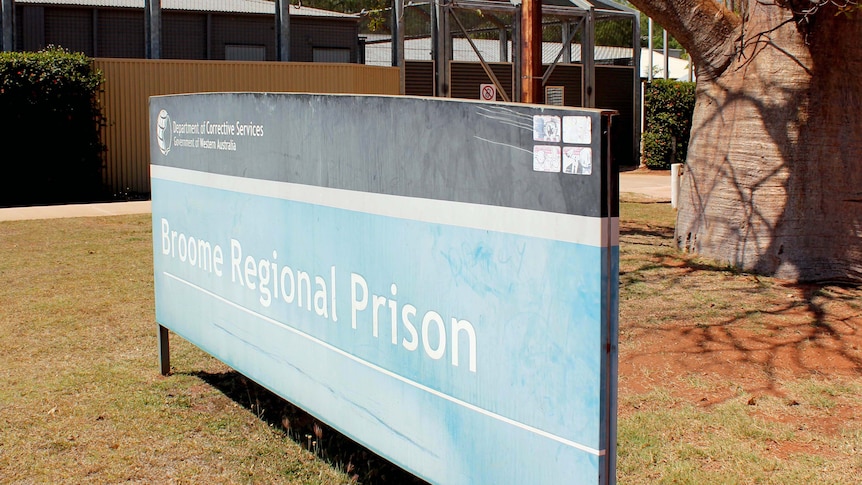 Broome Regional Prison, including sign outside and barbed wire and buildings, 22/08/12