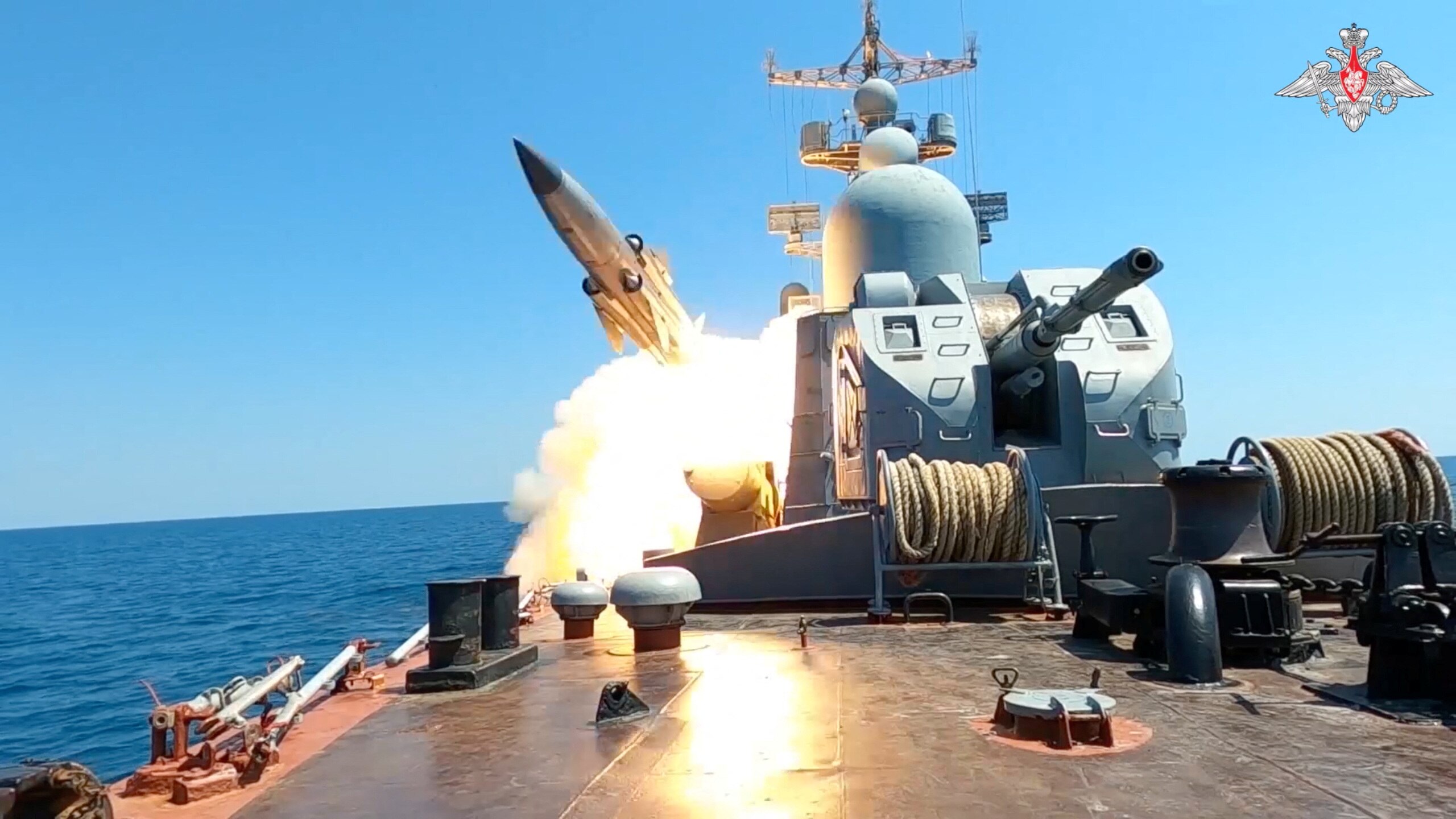 A ship launching a guided missile. 
