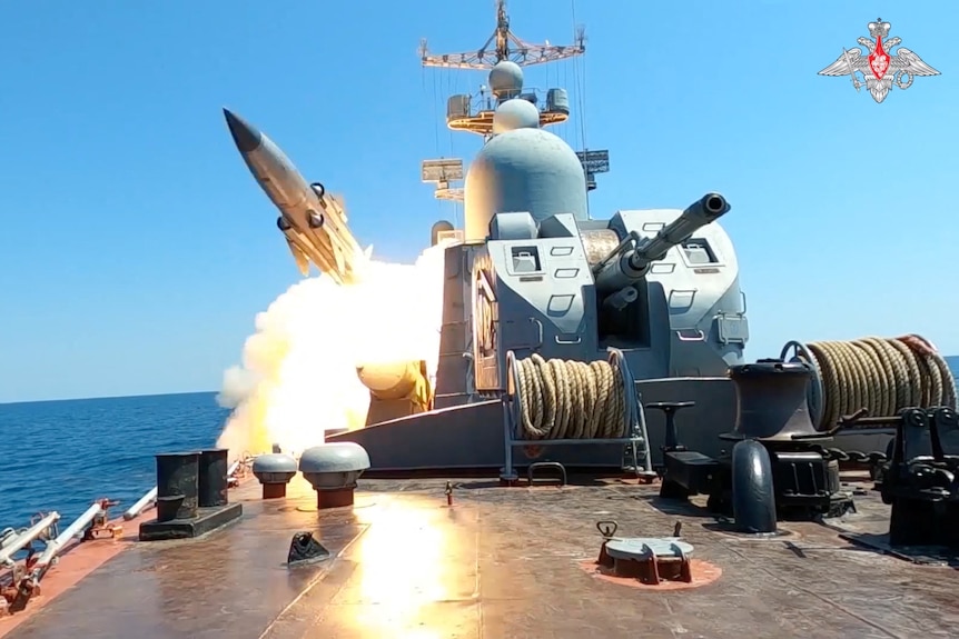 A ship launching a guided missile. 