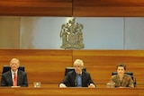 LtoR Ron McLeod, Bernard Teague (Commission Chair) and Susan Pascoe listen to submissions