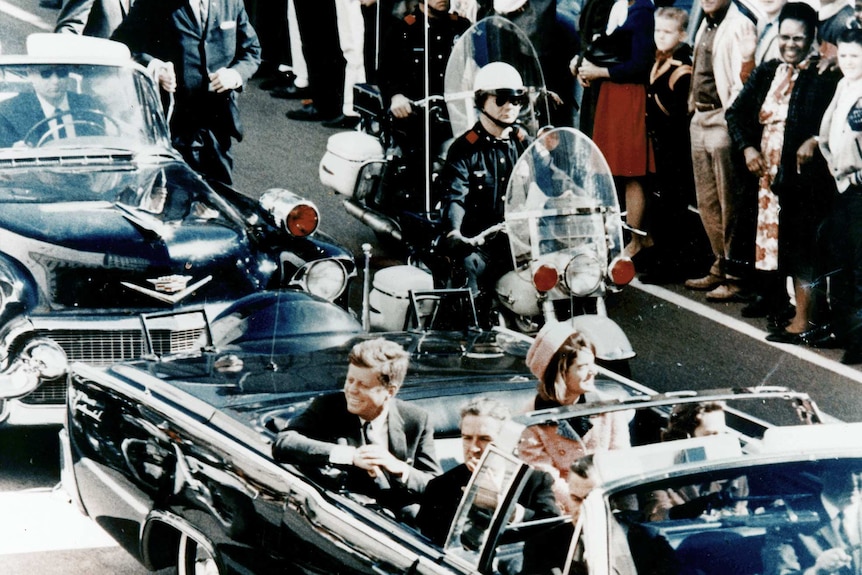 John F Kennedy on Main Street, in Dallas, minutes before he was assassinated.