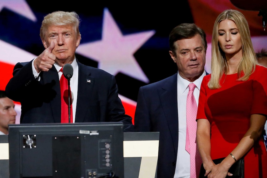Donald Trump gives a thumbs up alongside his campaign manager Paul Manafort