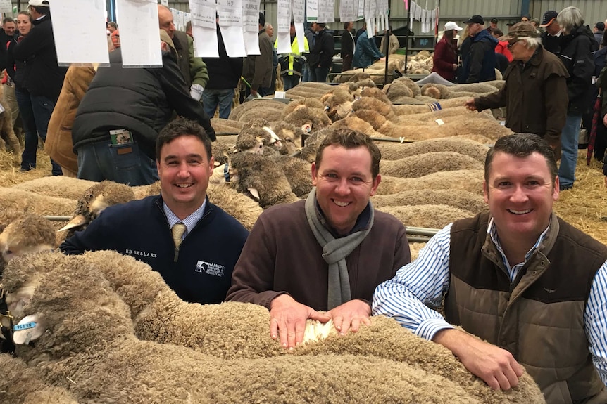Sheepvention president Gordon Last, with Elite Livestock Auctions' Miles Pfitzner and Chris Norris in Hamilton.
