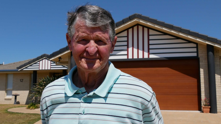 Mark Weir outside his house