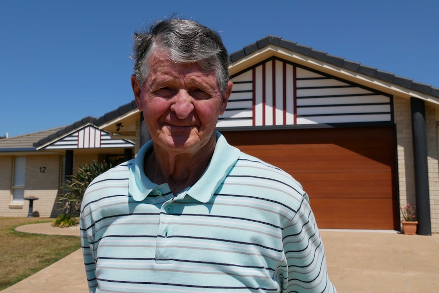 Mark Weir outside his house