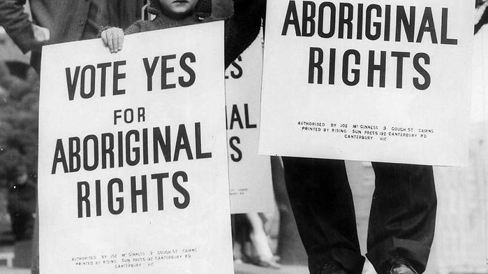 Campaigners for 1967 Aboriginal referendum carrying placards