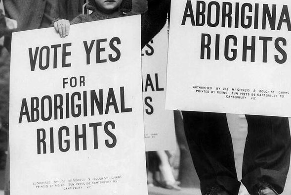 Campaigners for 1967 Aboriginal referendum carrying placards