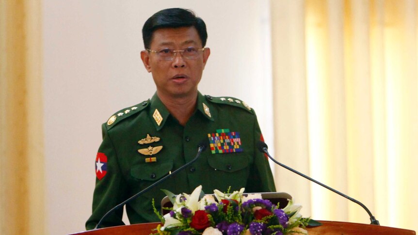Myanmar's military spokesman General Mya Tun Oo stands at a lectern during a press conference.