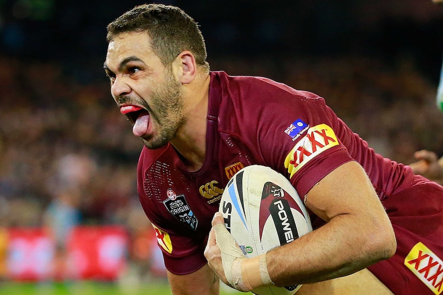 Greg Inglis celebrates a try in Origin II