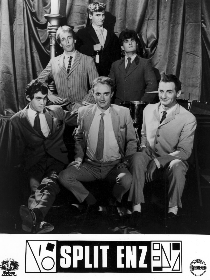 Black and white photo of Split Enz wearing suits and ties
