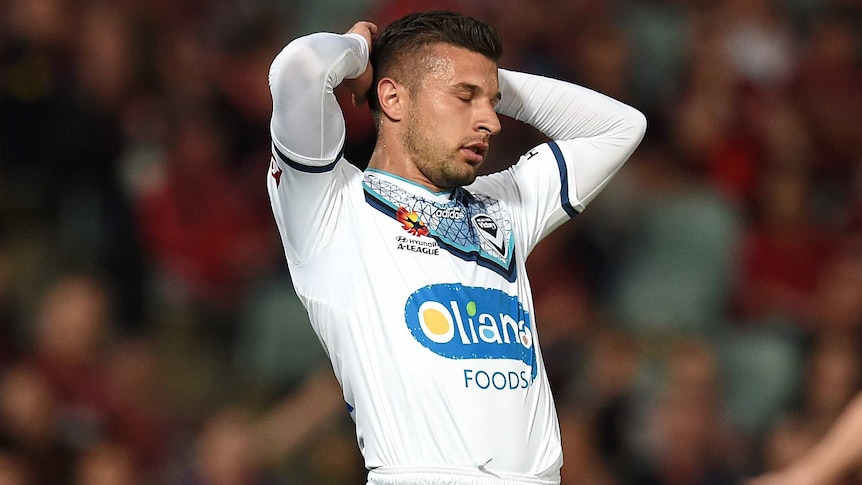 Kosta Barbarouses of Melbourne Victory reacts after missing a shot against Western Sydney Wanderers.