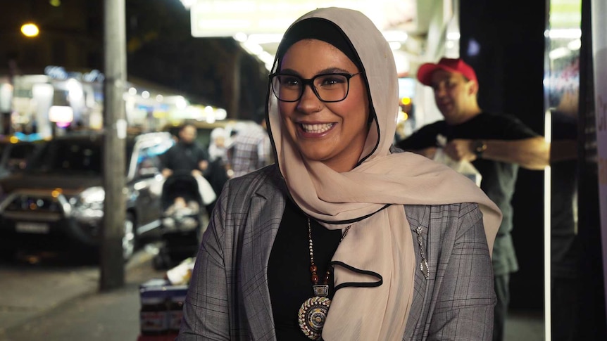 Rania Hussein smiling at the Ramadan night market in Lakemba, in Sydney's west.