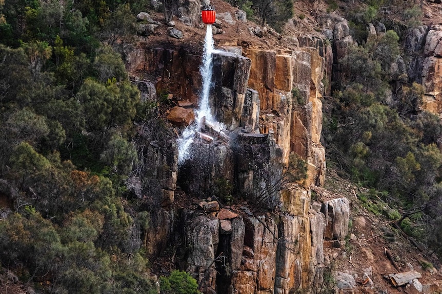 Water is dropped against a cliff face near Orford