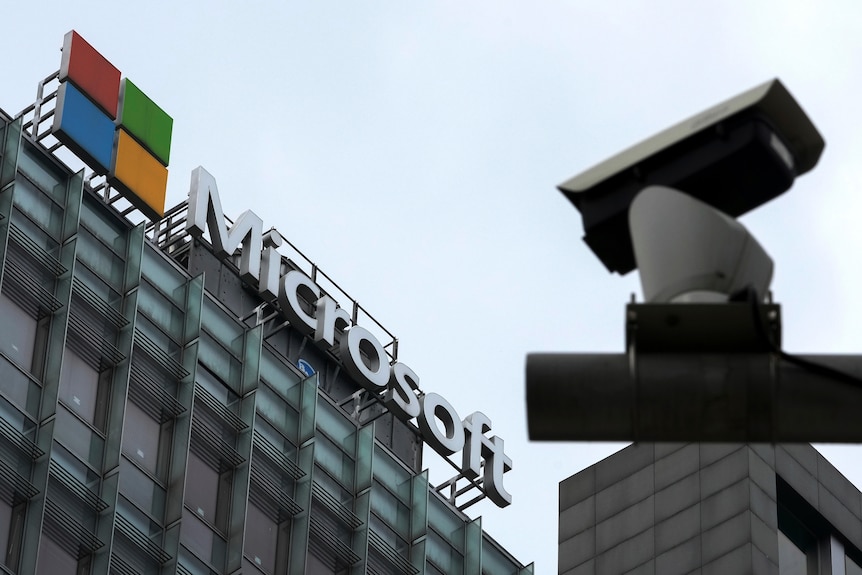 A security surveillance camera is seen near the Microsoft office building in Beijing.