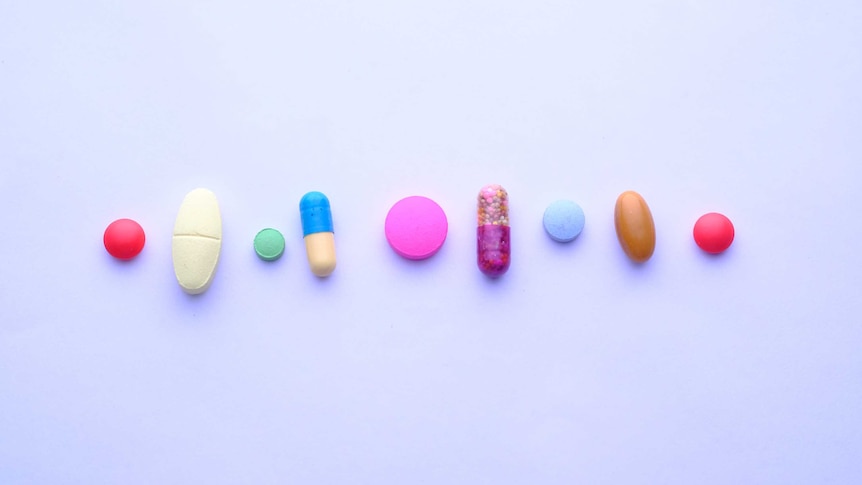 Collection of colourful tablets, pills and capsules