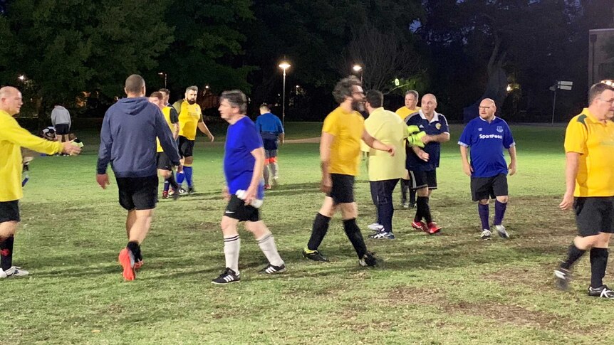 Men on a soccer pitch