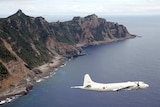 Japanese Maritime Self-Defence Force flies over disputed islands