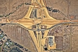 An aerial image of a rural freeway under construction