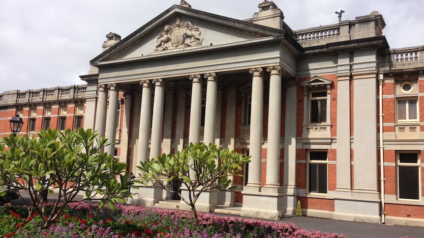 A wide shot of the exterior of the Supreme Court in Perth on a sunny day.