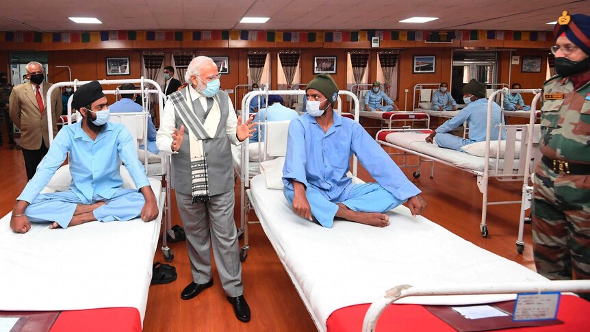 Indian Prime Minister Narendra Modi visits soldiers receiving treatment after being injured in clashes with Chinese soldiers