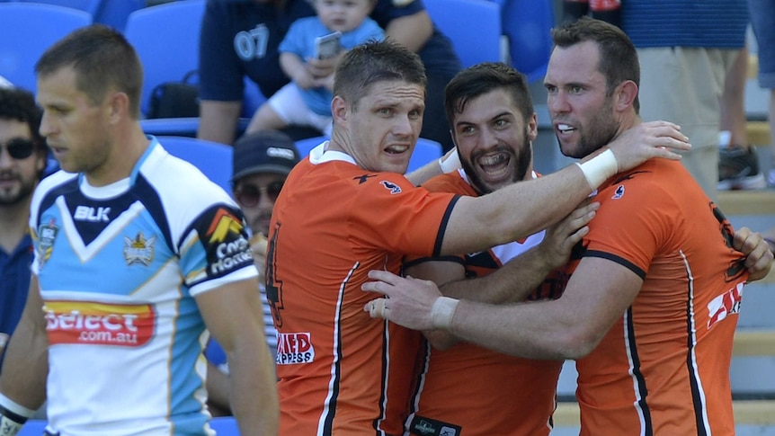 Happy campers ... Pat Richards (R), Chris Lawrence (L) and James Tedesco celebrate a try