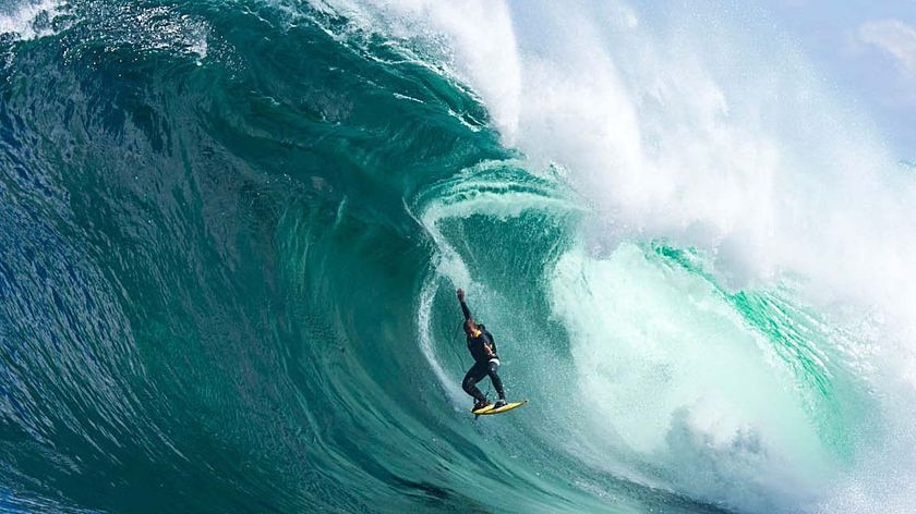 Australian Surfer Ryan Hipwood 'flies' during an airborne drop at Shipstern Bluff