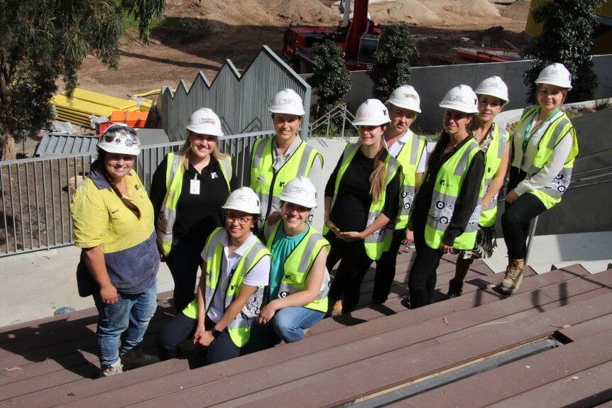 a group of women on a construction site