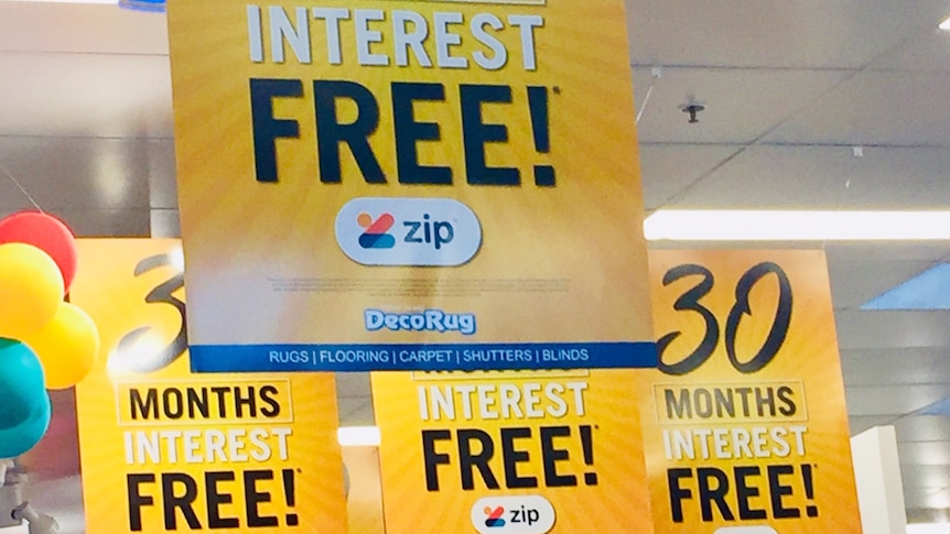 A yellow sign advertising 30 months interest free