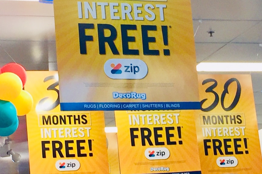 A yellow sign advertising 30 months interest free