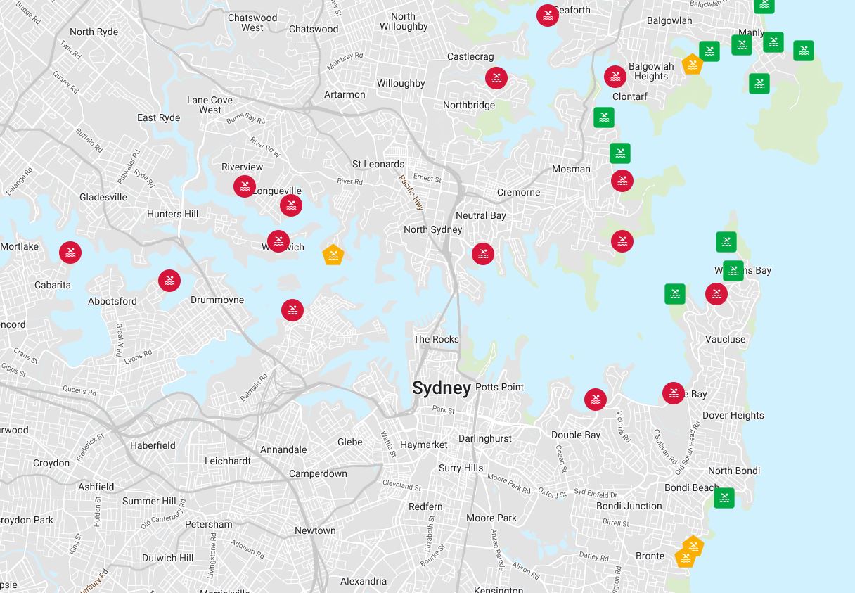 A geographical map of Sydney's north with red, yellow and green spots highlighting pollution at certain beaches and pools.