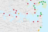 A geographical map of Sydney's north with red, yellow and green spots highlighting pollution at certain beaches and pools.