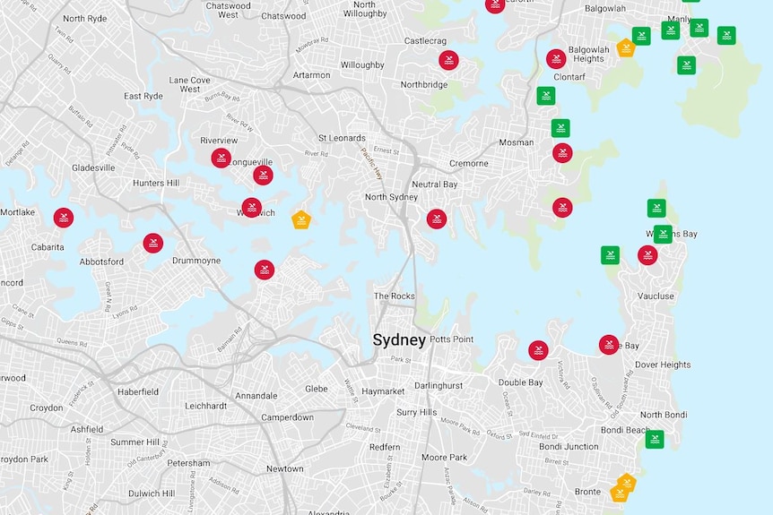 A geographical map of Sydney's north with red, yellow and green spots highlighting pollution at certain beaches and pools.