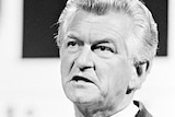 A black and white photo of former prime minister Bob Hawke.