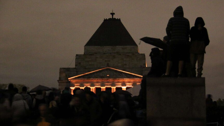 The crowd looks on at Melbourne's dawn service